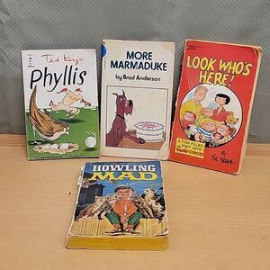 4 paperback cartoon books  